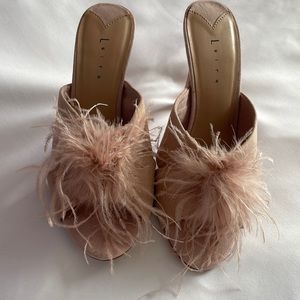 Beautiful blush pink suede heels with feather detail